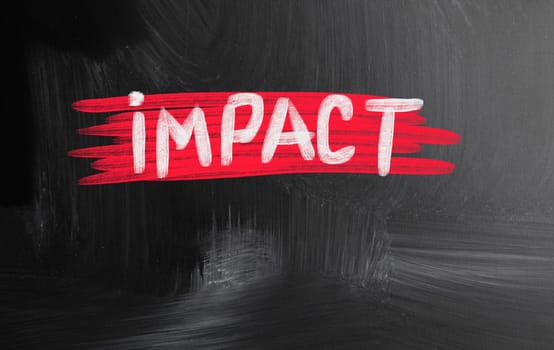 impact handwritten with chalk on a blackboard