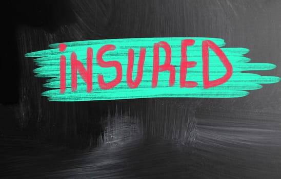 insured handwritten with chalk on a blackboard
