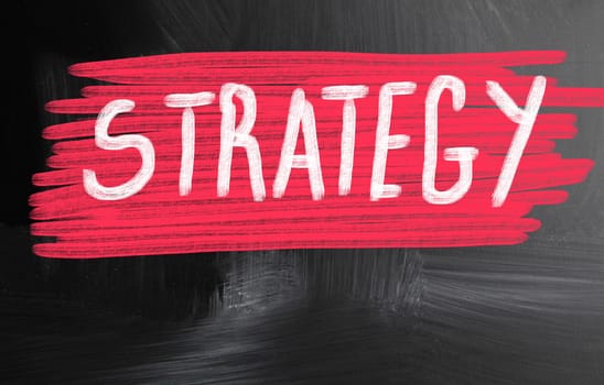strategy handwritten with chalk on a blackboard