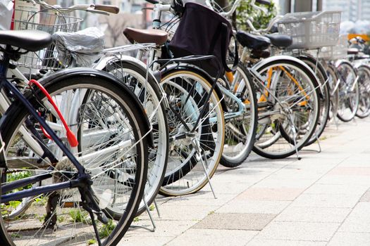 Bicycles parked on a street in Tokyo, Japan