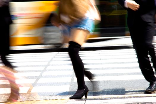 People commuting in rush hour at zebra crossing,Tokyo japan