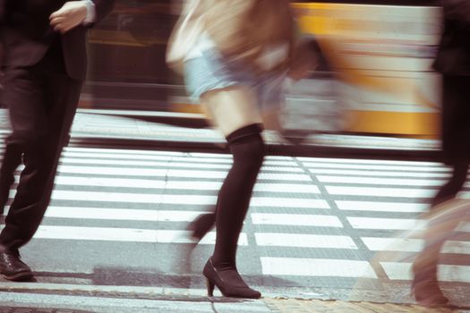 People commuting in rush hour at zebra crossing,Tokyo japan