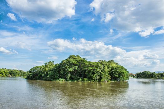 Island in the middle of the Ping River with beautiful sky in thailand