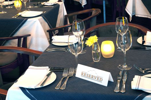 Table in the restaurant. Reserved for guests