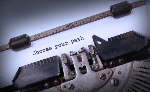 Vintage inscription made by old typewriter, choose your path