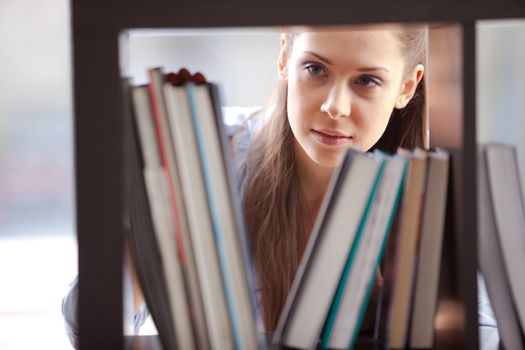 portrait of an  college student studying in the library 