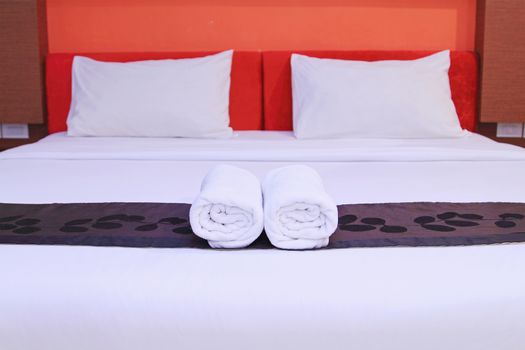 White clean towels on the hotel bed