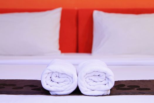 White clean towels on the hotel bed