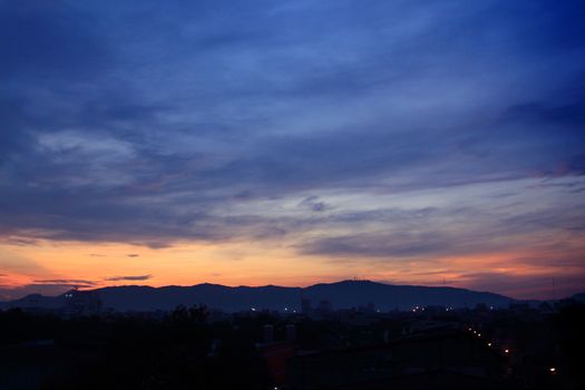 Scenic mountain sunrise over Hat Yai city
