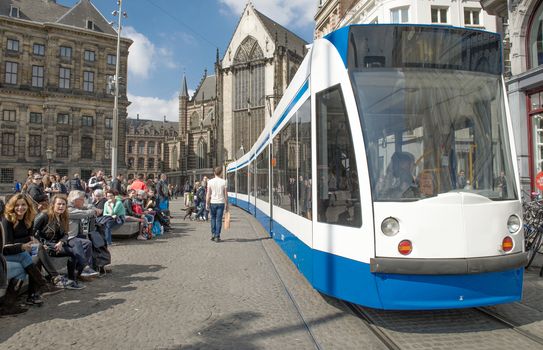 Amsterdam, The Netherlands - April 05, 2014; Public Transportation of Amsterdam providing integrated metro, tram and bus service throughout Amsterdam and its surrounding areas. Trams provide the best way to get around Amsterdam and run regularly until 12:15am.