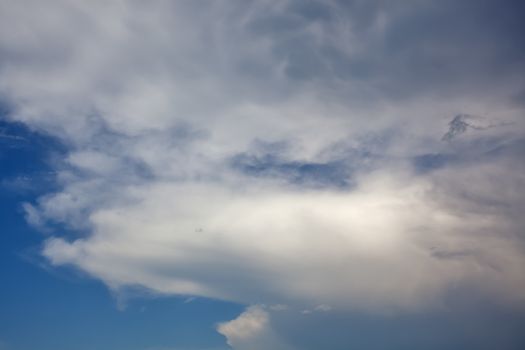 White easy clouds in the blue sky