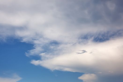 White easy clouds in the blue sky