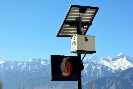 traffic light and solar cell panel in Leh, Ladakh, India.