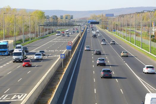 Highway with cars passing by