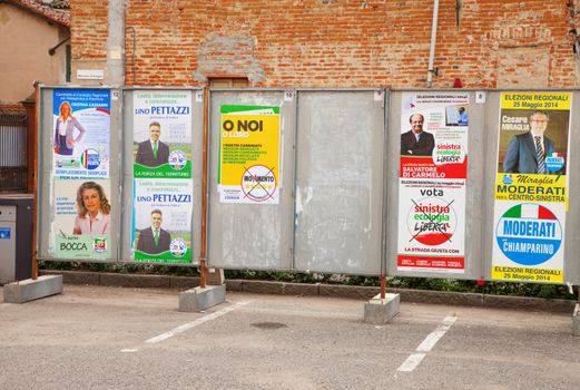 OCCIMIANO, ITALY - MAY 21, 2014: Election posters in public place, for European and Regional elections