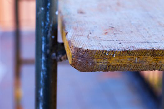 Wooden table of an industrial scaffold, close up