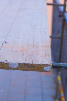 Wooden table of an industrial scaffold, close up