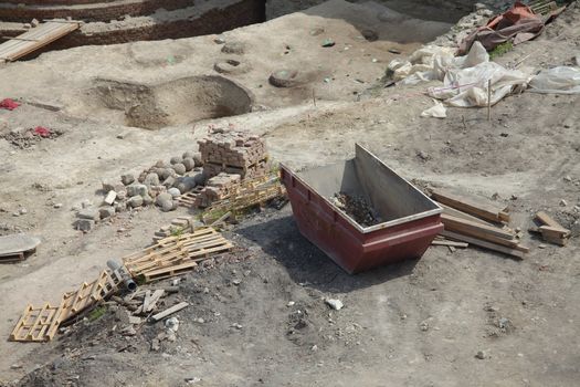 Construction site with metal container