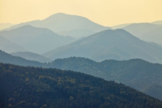 High mountain landscape in hazy weather, soft natural background.