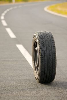 Wheel of a car on a road