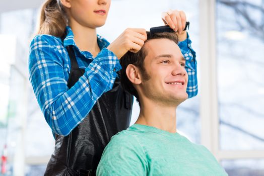 young attractive woman hairdresser hairstyle customer picks