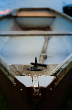 A Rustic Old Rowboat Beside A Lake (With Shallow DoF)