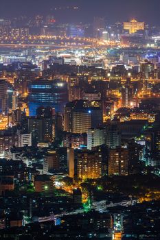 Modern city night with skyscrapers in Taipei, Taiwan, Asia.