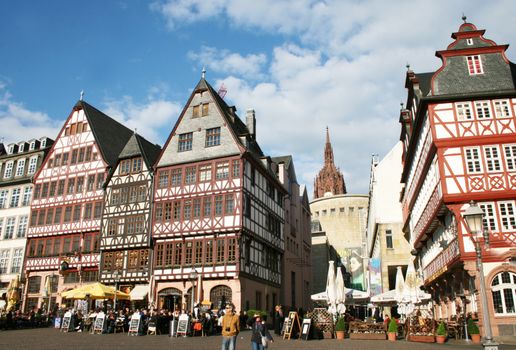 FRANKFURT AM MAIN, GERMANY, MAY The 3rd 2014: The Romer Square, one of the oldest and most historic sections of Frankfurt am Main, featuring Roman bath ruins and gabled, gothic row houses.