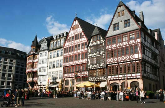 FRANKFURT AM MAIN, GERMANY, MAY The 3rd 2014: The Romer Square, one of the oldest and most historic sections of Frankfurt am Main, featuring Roman bath ruins and gabled, gothic row houses.
