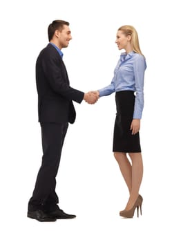 bright picture of man and woman shaking their hands.