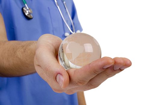 Doctor hand holding a symbolic globe. Global medicine.