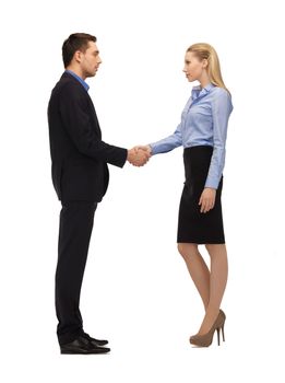 bright picture of man and woman shaking their hands.