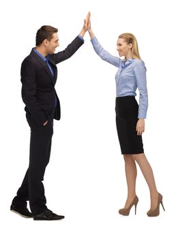 bright picture of man and woman giving a high five.