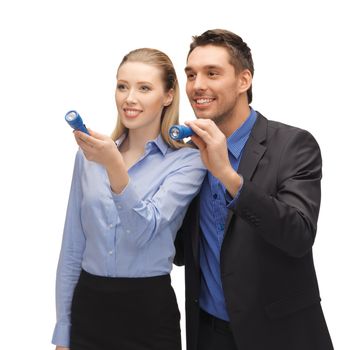 bright picture of man and woman with flashlights.