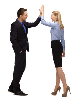 bright picture of man and woman giving a high five.