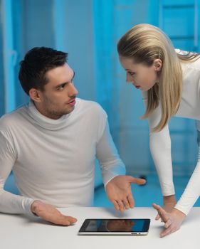 picture of man and woman in space laboratory