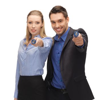 bright picture of man and woman with flashlights.