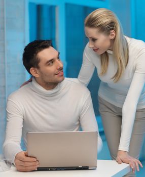 picture of man and woman in space laboratory