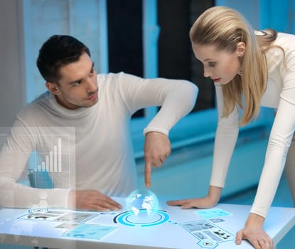 picture of man and woman working with virtual screens