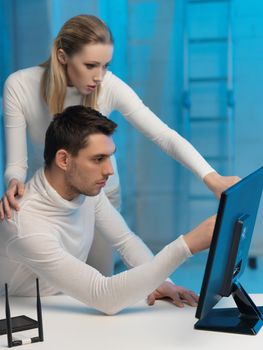 picture of man and woman in space laboratory