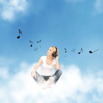 picture of happy teenage girl in big headphones sitting on cloud