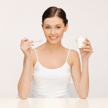 bright picture of beautiful woman with yogurt