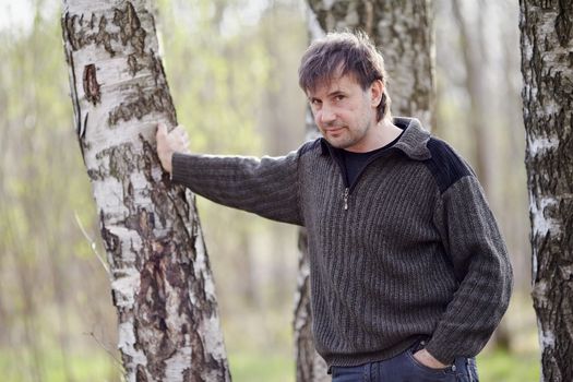 Portrait of the young man. Young man. The young man outdoors.