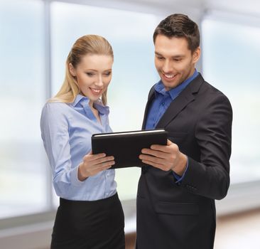 bright picture of man and woman with tablet pc