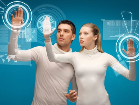 picture of man and woman working with virtual screens