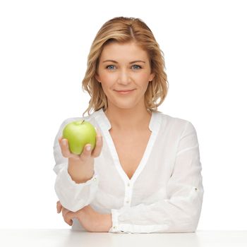 picture of woman in casual clothes with green apple