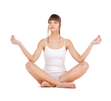 sporty woman in cotton underwear practicing yoga lotus pose