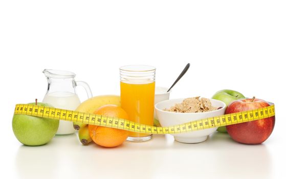 close up of healthy breakfast and measuring tape