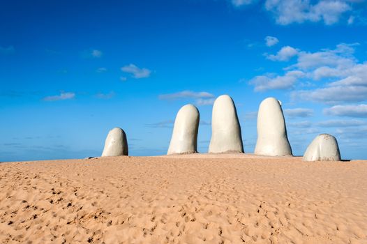 Hand Sculpture, the simbol of Punta del Este, Uruguay. It's a plastic work standing here since the summer of 1982, when the Chilean artist Mario Irraz��bal was invited to take part in the 1st International Meeting of Modern Sculpture in the Open Air held in the City of Punta del Este. 
