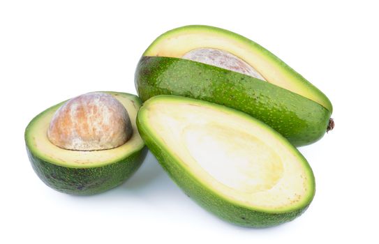 Fresh Ripe Avocado Full Body and Halves isolated on white background